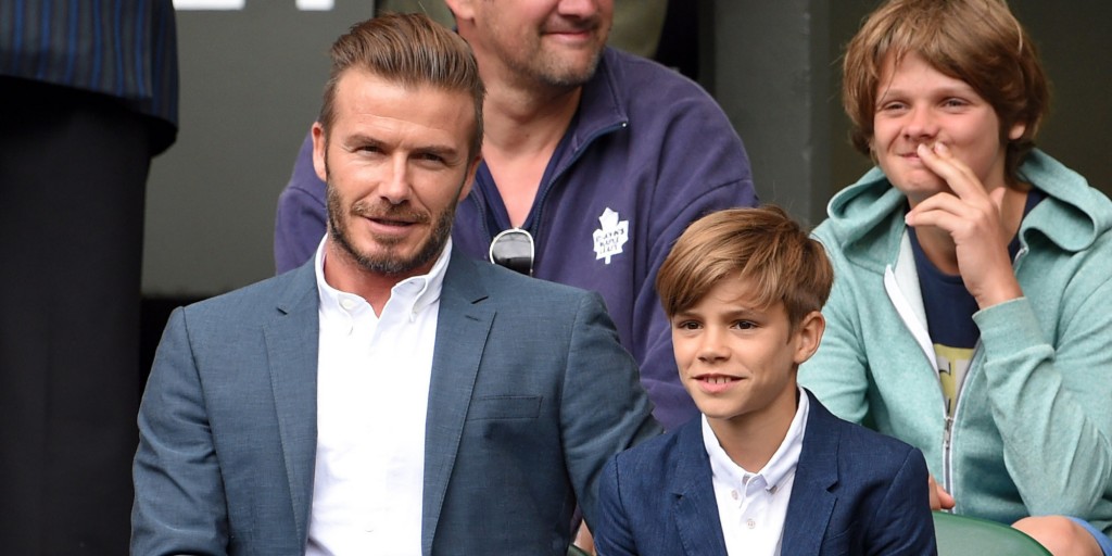 LONDON, ENGLAND - JULY 08:  David Beckham and Romeo Beckham attend day nine of the Wimbledon Tennis Championships at Wimbledon on July 8, 2015 in London, England.  (Photo by Karwai Tang/WireImage)